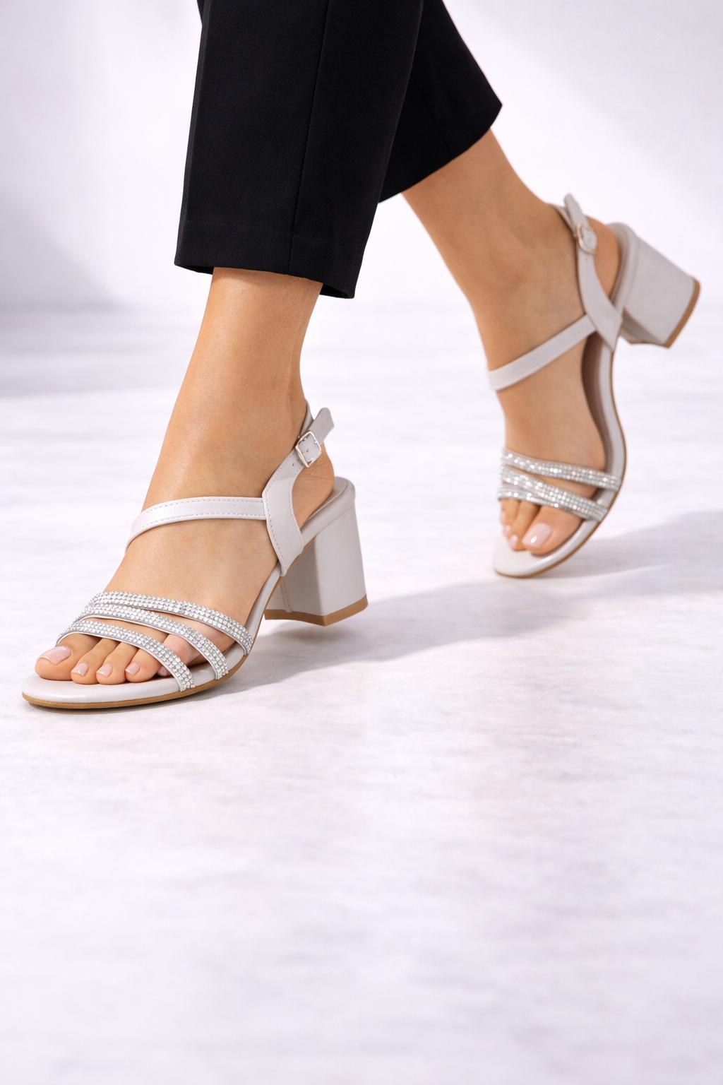 WhatsApp Image 2026-02-18 at 21.27.19 (1) Elara Bej Işıltılı Blok Topuk - Görsel 1